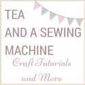 tea and a sewing machine badge