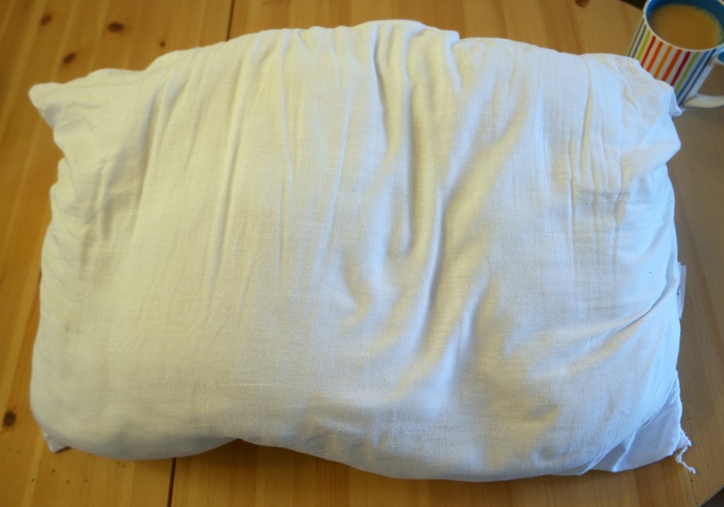 how to upcycle an old pillow into a cushion pad
