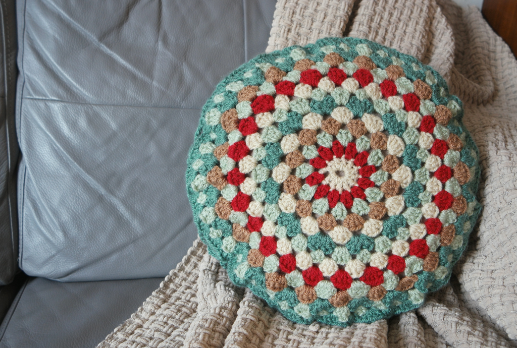 crocheted cushion cover