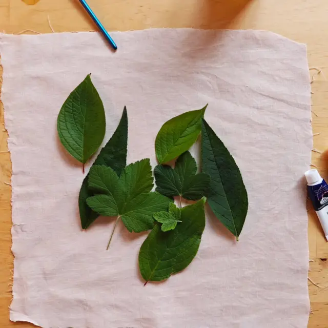 Printed leaves from last week. It turns out that gouache is quite nice for printing on fabric, as long as you don't have plans to wash it!

I added a little bit of embroidery, some backstitch worked in gold thread. I like it so much I might put it in a frame and hang it up somewhere!

The idea for printing with leaves is taken from the Wild Blossom Companion.

I've created the Wild Blossom Companion around the idea of creative invitations, which are open ended creative suggestions, designed to encourage playful explanation. 

Each month has a theme, and it also includes a little reflective piece to read, some lovely quotes and some journaling prompts. 

If you're the kind of person who likes being in nature, who wants to pay attention to the small things, seasonal shifts and everyday joys that are often overlooked, then you might quite like The Wild Blossom Companion. 

The link is in my bio, and if you are not ready to commit to a whole year, the June edition is available as a standalone month on Etsy. That link's in my bio too 🌸🌿💖

#creativelife
#creativepause #inspiredbynature #slowdownabit #wildblossomlife #wildblossomcompanion